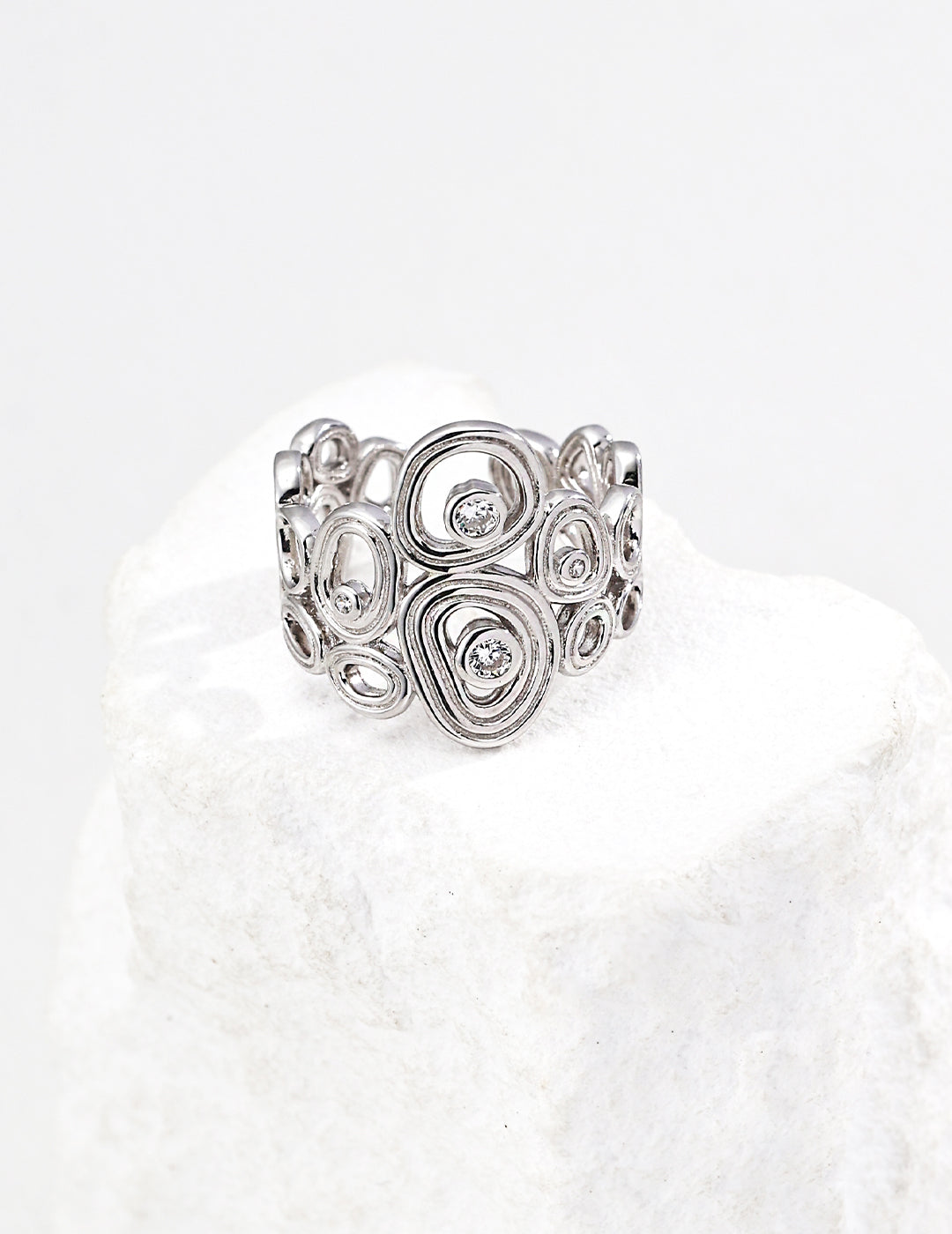 Dare To Sparkle - Statement wide hollow open adjustable rings featuring artistic fluid cells and embedded cz crystals in silver