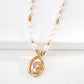 Vintage gold queen cameo necklace with natural pearls