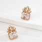 Dare To Sparkle - Glamorous gold stud earrings with a large rectangular radiant-cut cz crystal and vintage engraved floral pearl top