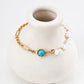 Dare To Sparkle - Statement asymmetric bracelet featuring half gold vintage chain and half freshwater pearls with natural green turquoise gemstone accents