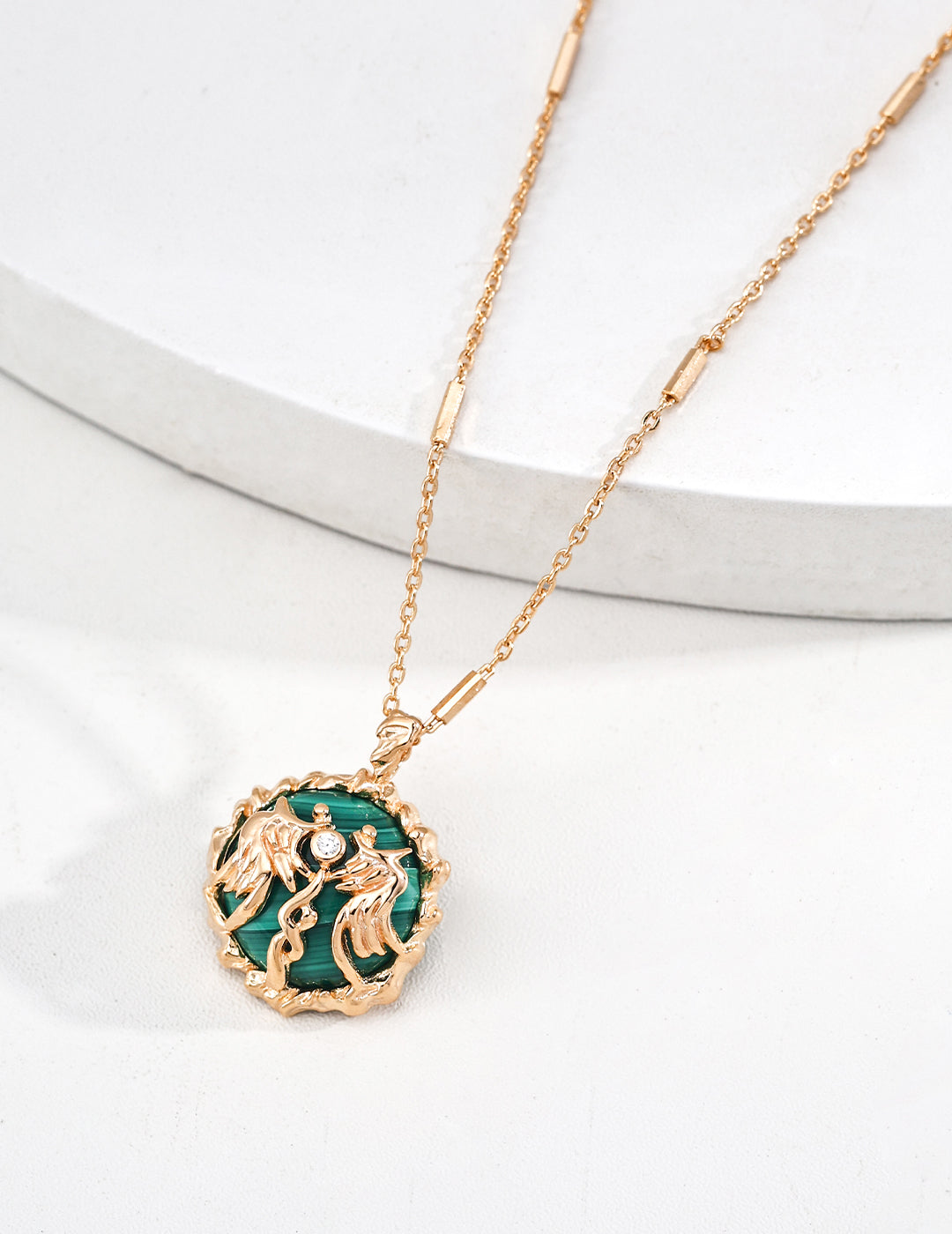 Dare To Sparkle - Vintage gold pendant necklace with a natural green malachite stone surrounded by an intricate mythical flame fluid border