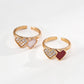 Dare To Sparkle - Romantic enamel heart open adjustable rings with a central sparkling cz crystal in vibrant red and gold finishes