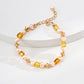 Dare To Sparkle - Elegant vintage bracelet featuring natural warm honey amber stones and lustrous champagne pearls with gold textured spacers