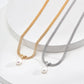 Dare To Sparkle - Statement multi-strand flat mesh snake chain necklaces with a central crossed knot loop and a dangling teardrop natural pearl in silver and gold