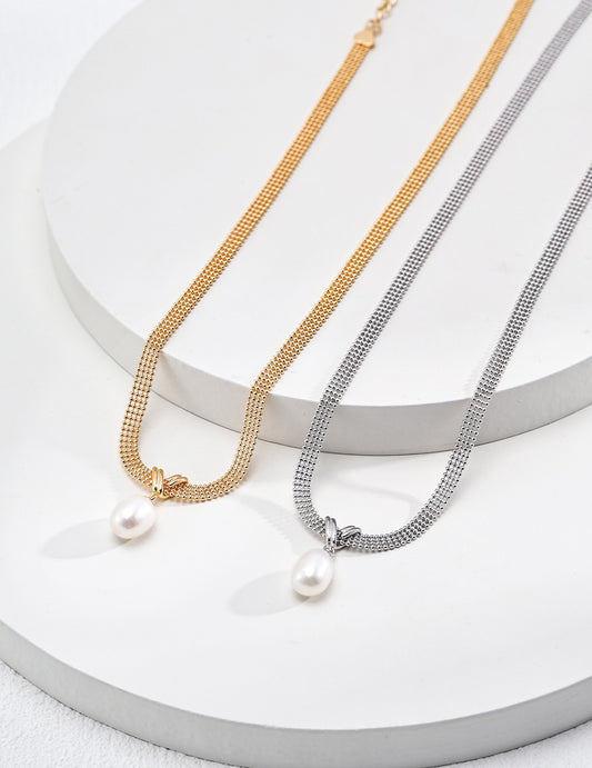 Dare To Sparkle - Statement multi-strand flat mesh snake chain necklaces with a central crossed knot loop and a dangling teardrop natural pearl in silver and gold