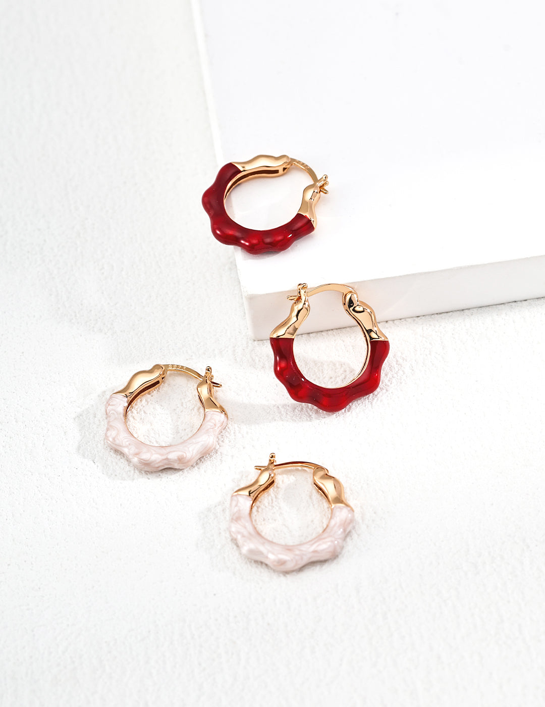 Dare To Sparkle - Vintage gold plated wave hoop earrings featuring half fluid metal and half glossy burgundy red and pearlescent white enamel finishes