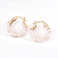 Vintage gold plated wave hoop earrings featuring half fluid metal and half glossy pearlescent white enamel finishes