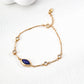 Dare To Sparkle - Elegant vintage gold chain bracelet featuring a central marquise natural deep blue lapis lazuli stone and bezel-set round cz crystals