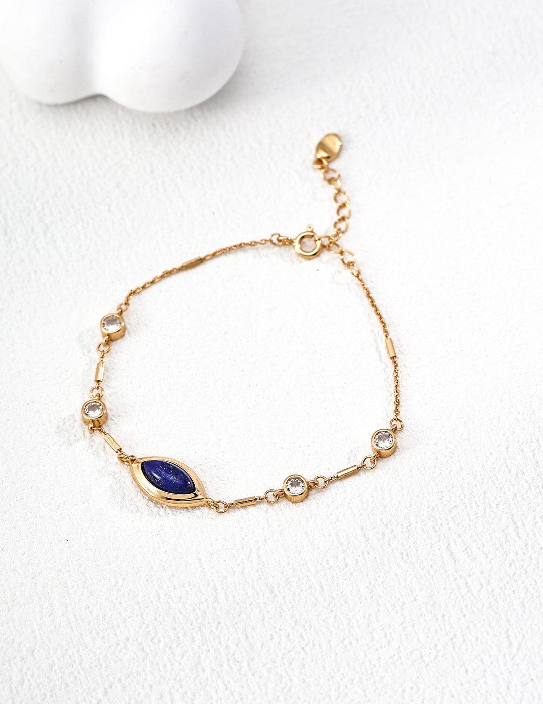 Dare To Sparkle - Elegant vintage gold chain bracelet featuring a central marquise natural deep blue lapis lazuli stone and bezel-set round cz crystals