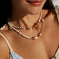 The "Heartbeat of the Sea" Necklace - Natural Pearl & Gilded Hearts