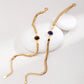 Dare To Sparkle - Sleek 18k gold plated flat herringbone snake chain bracelets with a central bezel-set oval natural lapis lazuli and tiger's eye stone