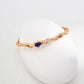 Dare To Sparkle - Antique style statement open cuff bracelet featuring an organic fluid molten gold texture centering a smooth oval natural blue lapis lazuli stone