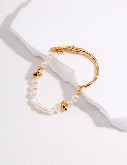 Dare To Sparkle - Avant-garde half-cuff half-strand bracelets featuring organic liquid molten gold metals, a custom fluid OT clasp, and irregular stone-shaped pearls