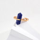 Dare To Sparkle - Antique-inspired statement open adjustable ring featuring a central round natural deep blue lapis lazuli stone within a geometric gold bezel