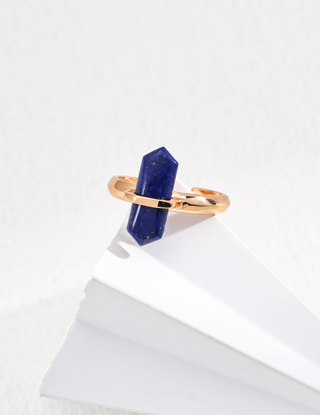 Dare To Sparkle - Antique-inspired statement open adjustable ring featuring a central round natural deep blue lapis lazuli stone within a geometric gold bezel