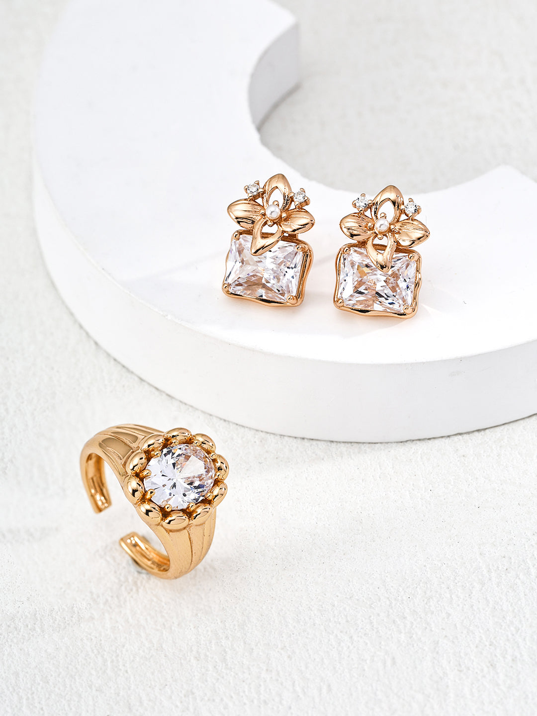 Gold large brilliant central cz stone ring and earrings