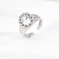 Dare To Sparkle - Luxury high-jewelry style open adjustable rings featuring a large brilliant central cz stone enclosed by a sculptural bubble bezel in silver