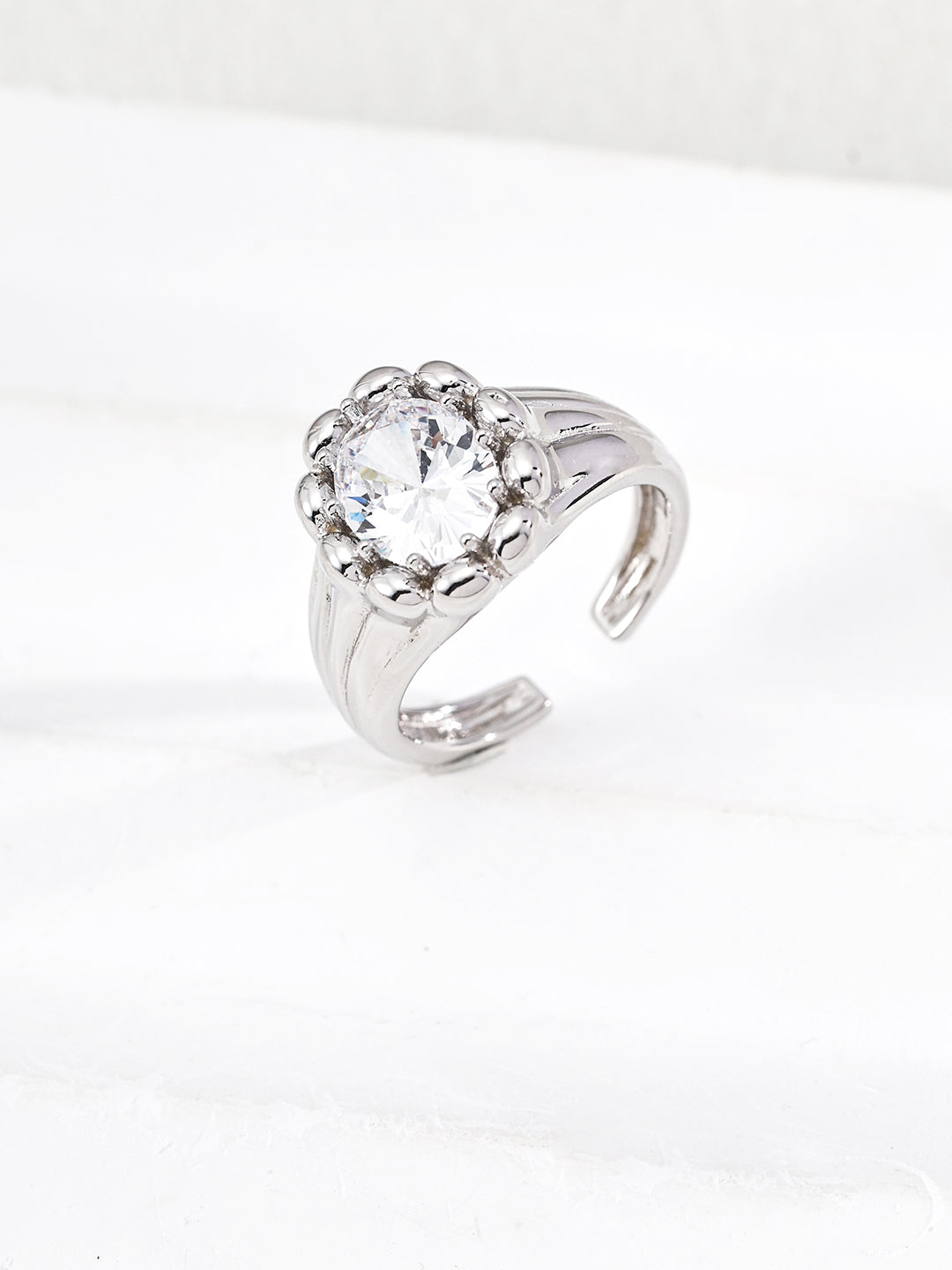 Dare To Sparkle - Luxury high-jewelry style open adjustable rings featuring a large brilliant central cz stone enclosed by a sculptural bubble bezel in silver