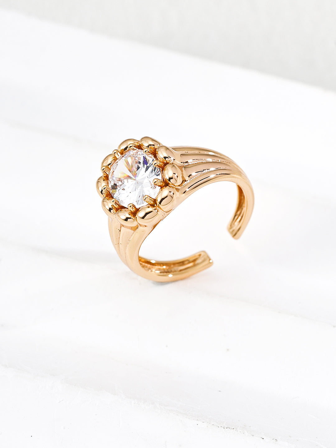 Dare To Sparkle - Luxury high-jewelry style open adjustable rings featuring a large brilliant central cz stone enclosed by a sculptural bubble bezel in gold