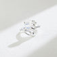 Silver ring with a large gemstone on a white background