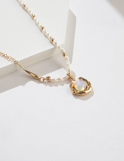Necklace with an opal pendant on a white background