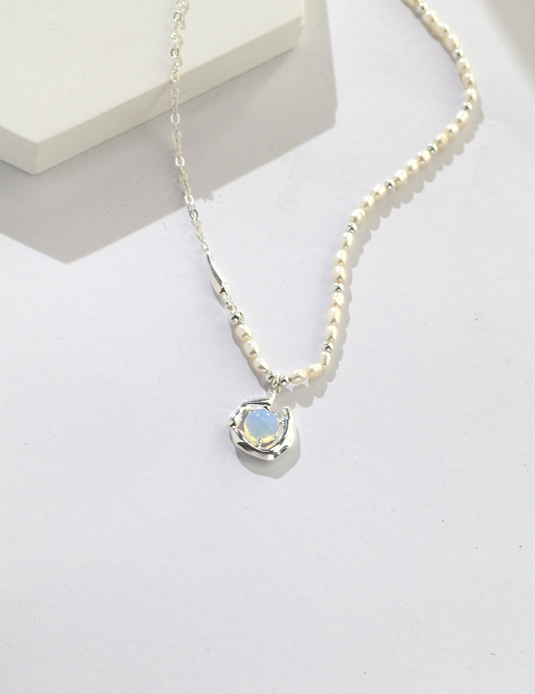 Necklace with a pendant on a white background