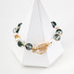 Dare To Sparkle - Elegant 18k gold plated bracelet featuring a strand of lustrous natural pearls, misty phantom quartz beads, and a central gold star coin charm with cz crystal