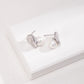 Dare To Sparkle - Avant-garde geometric stud earrings featuring fine deconstructive metallic wire loops and two staggered floating white shell pearls in silver