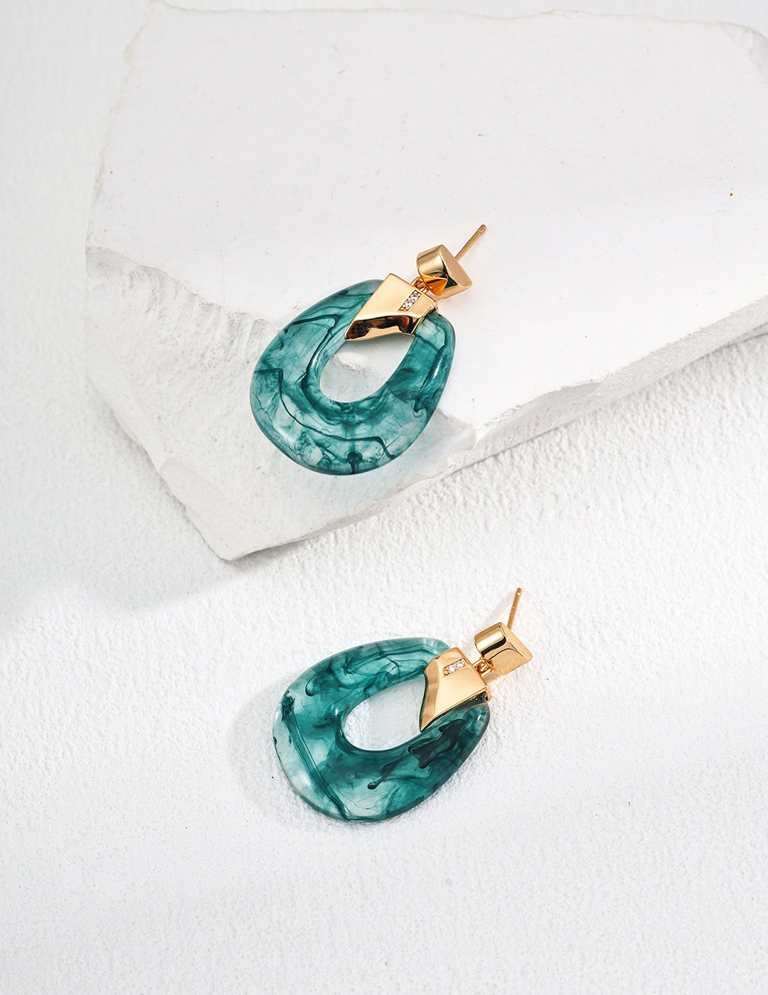 Dare To Sparkle - Art-gallery style drop earrings featuring smoky translucent ink-green moss agate faux resin hoops held by a geometric 18k gold plated claw with pavé cz crystals