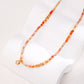 Dare To Sparkle - Avant-garde geometric choker necklace featuring a rare red and white tartan grid pattern natural agate pendant held by a sparkling micro-pavé cz bail