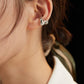 Dare To Sparkle - Avant-garde non-pierced ear cuff showing a wide high-polished fluid molten metal crumpled sculptural silhouette in sterling silver
