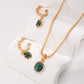Dare To Sparkle - Resort style jewelry set displaying an organic molten gold framed natural malachite pendant necklace and matching malachite c-hoop drop earrings